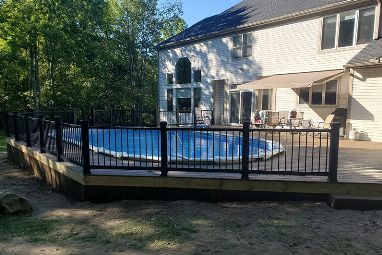 pool deck with metal railing