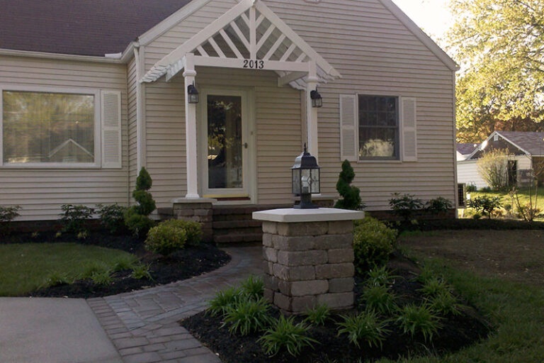 front door cover, paver, lighting, landscaping