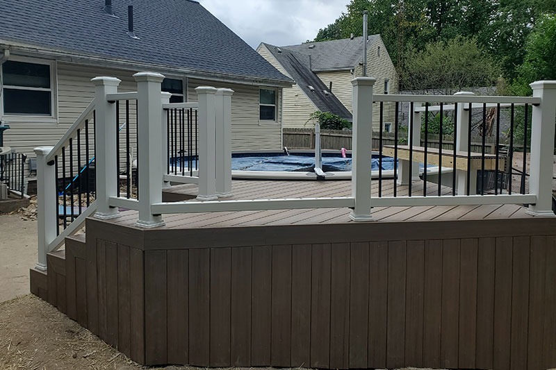 deck and railing around pool