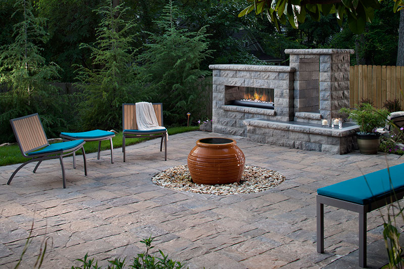 Outdoor fireplace, fire feature and paver patio