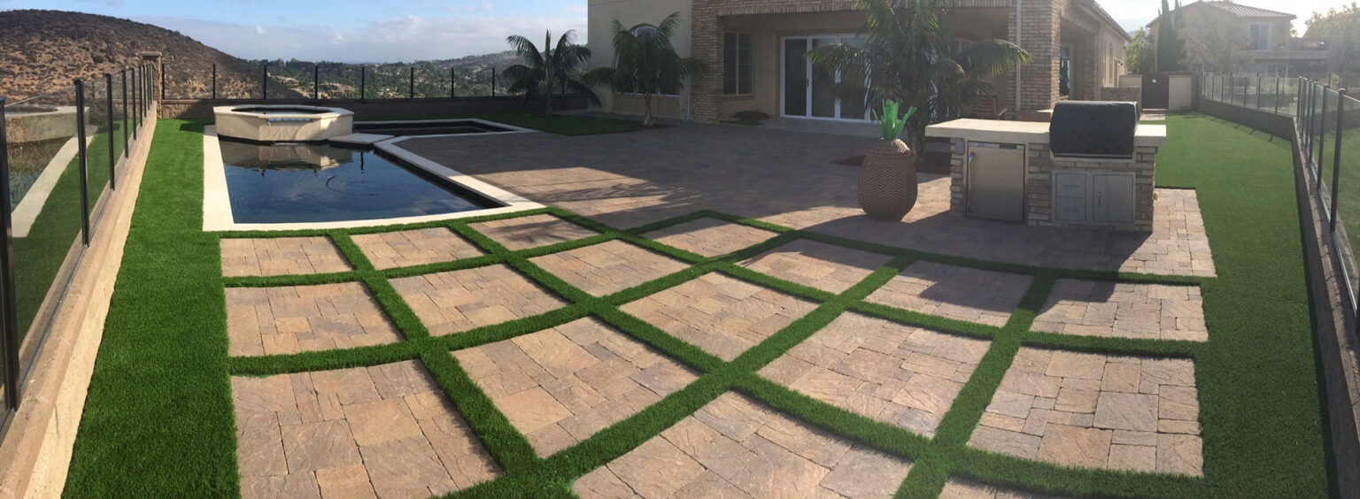 brick paver patio with inlaid artificial grass, outdoor kitchen, paver patio, landscaping