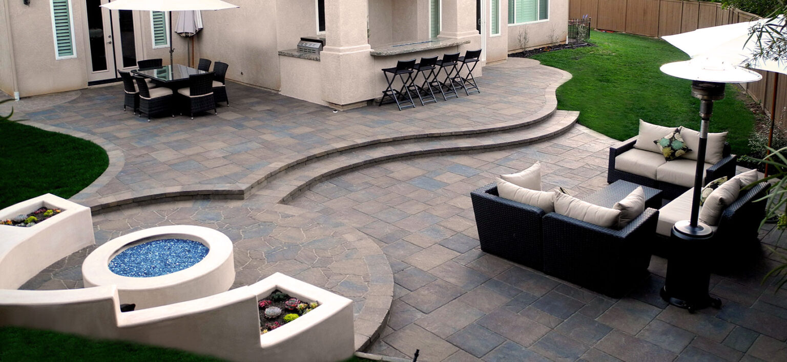 Outdoor landscape and hardscape, patio, firepit, pavers, outdoor kitchen